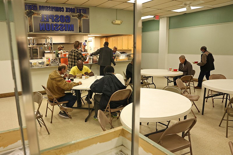 A traditional holiday meal is served to those in need on Easter in the dining hall at the Little Rock Compassion Center on Sunday, April 9, 2023. (Arkansas Democrat-Gazette/Colin Murphey)