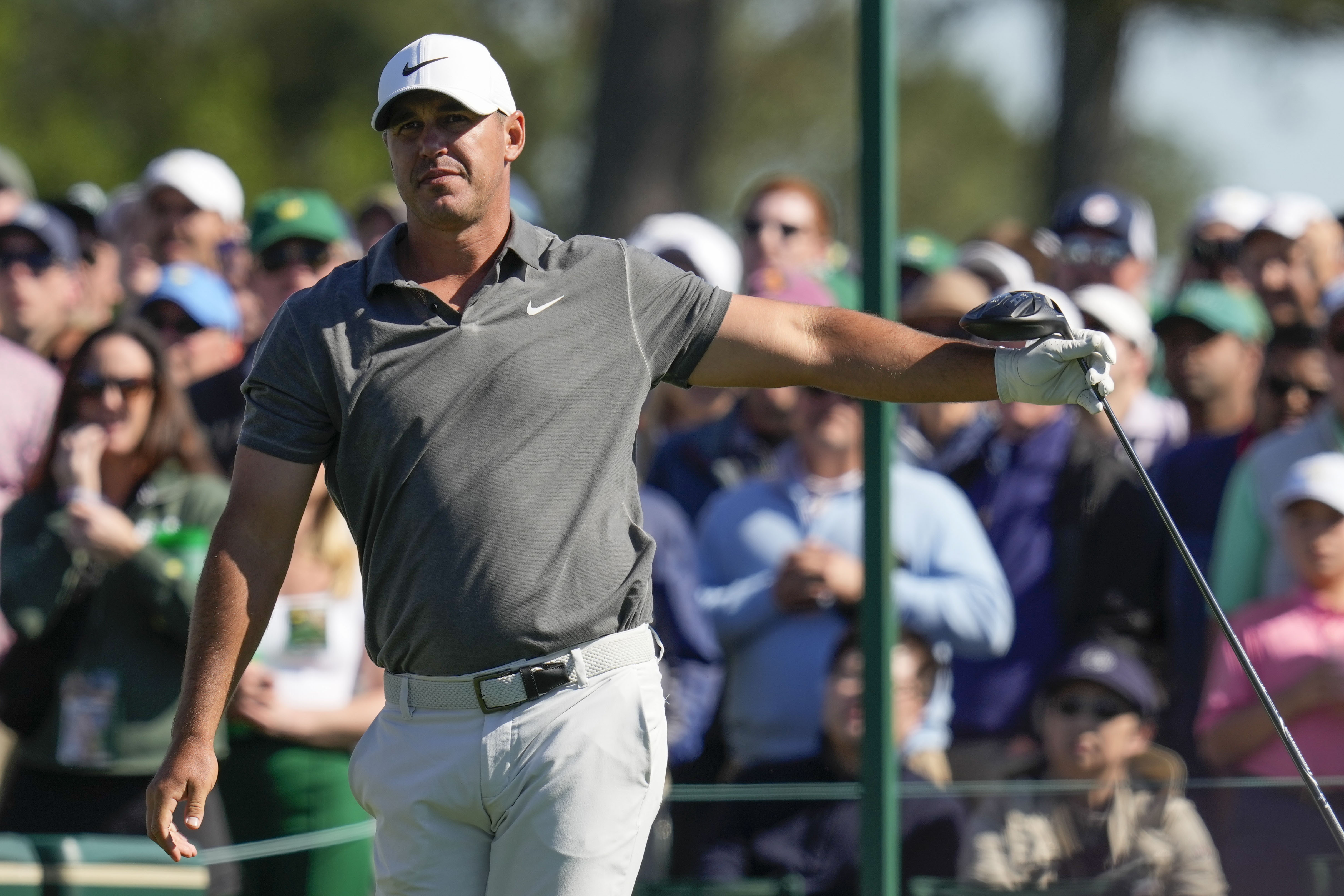 Jon Rahm kisses wife Kelley Cahill after winning 2023 Masters