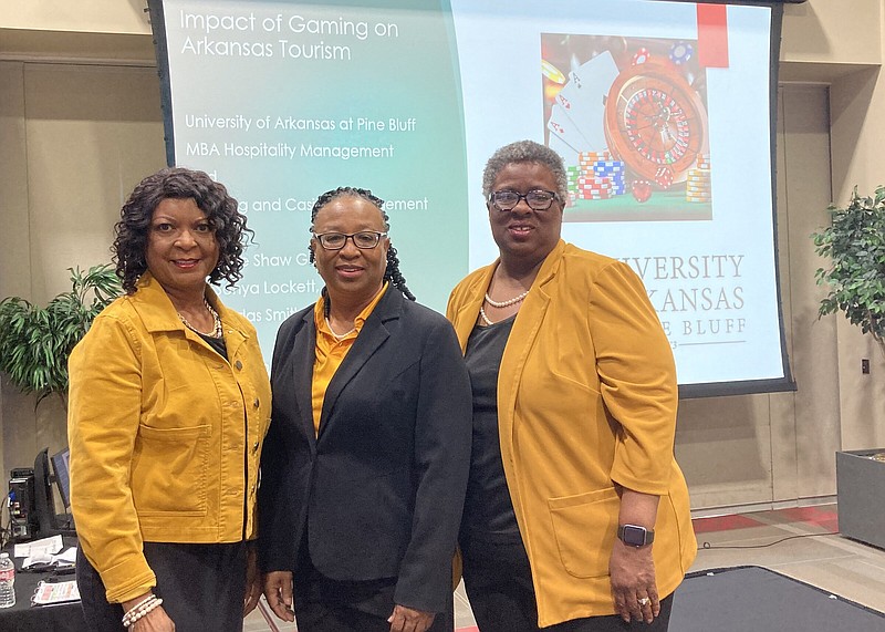 Suzzette Goldmon (left) Ph.D., Carlas R. Smith, and Sonya Lockett attend the Governors Conference on Tourism. (Special to The Commercial/University of Arkansas at Pine Bluff)