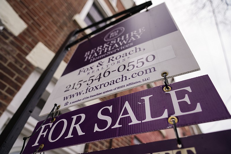A for sale sign is posted near a home in Philadelphia, Wednesday, Jan. 4, 2023. On Thursday, Freddie Mac reports on this week's average U.S. mortgage rates. (AP Photo/Matt Rourke)