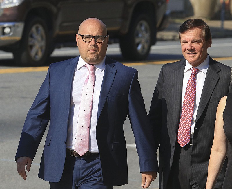 Former Arkansas Sen. Jeremy Hutchinson (left) arrives in 2018 at the federal courthouse in Little Rock with his father, former U.S. Sen. Tim Hutchinson. 
(File Photo/Arkansas Democrat-Gazette)