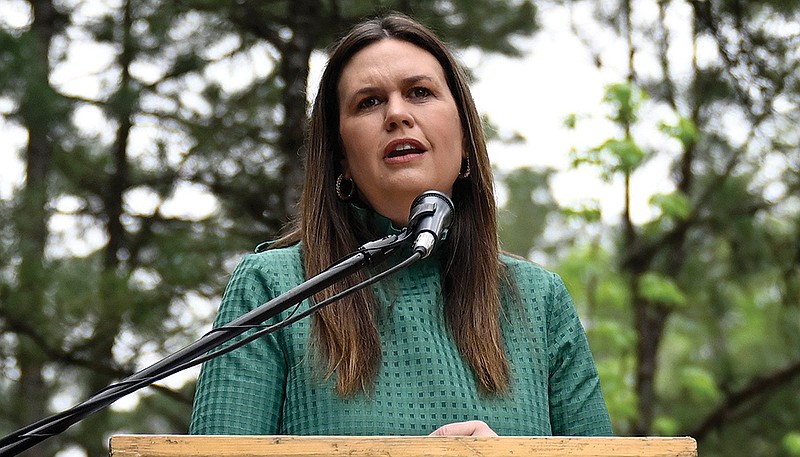 Governor Sarah Huckabee Sanders addresses the media Thursday during a signing ceremony for several bills intended to encourage tourism to Arkansas parks during a signing at Pinnacle Mountain State Park.
(Arkansas Democrat-Gazette/Stephen Swofford)