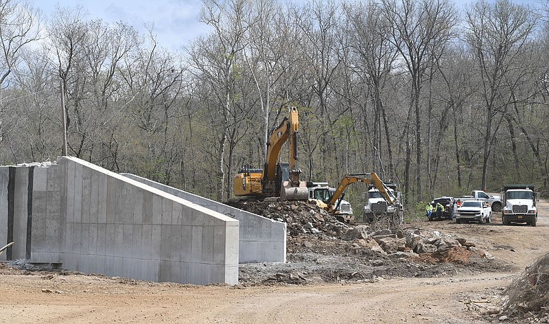 Work to demolish a bridge continues Thursday along Wyola Road at its intersection with Parker Branch Road near Brentwood in south Washington County. Visit nwaonline.com/photo for todays photo gallery.

(NWA Democrat-Gazette/Andy Shupe)