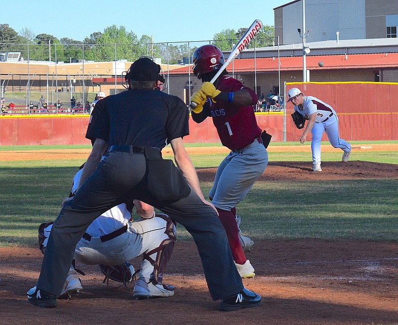 Lake Hamilton's Kohen Manley (3) delivers to Texarkana's Luke Paxton (1) Friday at Wolf Field. - Photo by Donald Cross of The Sentinel-Record