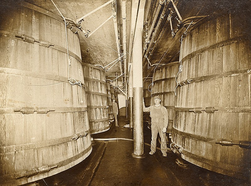 A worker poses with the brew vats at the Little Rock Brewing & Ice Company in Little Rock (Pulaski County); circa early 20th century.
(Courtesy of the Butler Center for Arkansas Studies, Central Arkansas Library System)