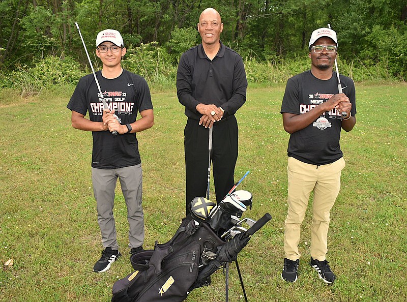 Freshman medalist Ismael Garcia (left) and medalist Patrick Mwendapole (right) helped the UAPB men's golf team win the SWAC championship this week in Flowood, Miss. Standing in the middle is head coach Roger Totten. (Pine Bluff Commercial/I.C. Murrell)
