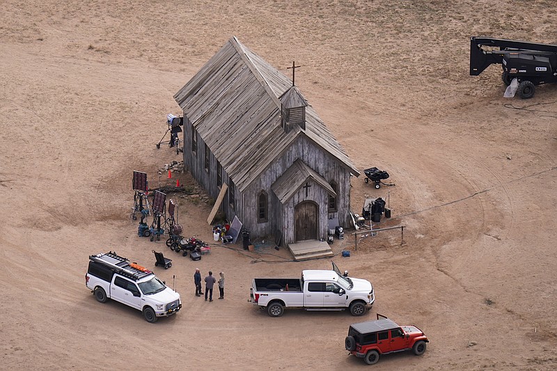 FILE - This aerial photo shows the movie set of "Rust" at Bonanza Creek Ranch in Santa Fe, N.M., on Saturday, Oct. 23, 2021. Prosecutors in New Mexico plan to drop an involuntary manslaughter charge against Alec Baldwin in the fatal 2021 shooting of a cinematographer on the set of the Western film “Rust.” Baldwins attorneys said in a statement Thursday that they are pleased with the decision to dismiss the case. (AP Photo/Jae C. Hong, File)