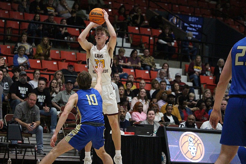 Lake Hamilton's Ty Robinson (33) shoots while Harrison's Blake Shrum (10) defends March 4 in the Class 5A state tournament semifinals at Pine Bluff Convention Center. - Photo by Krishnan Collins of The Sentinel-Record