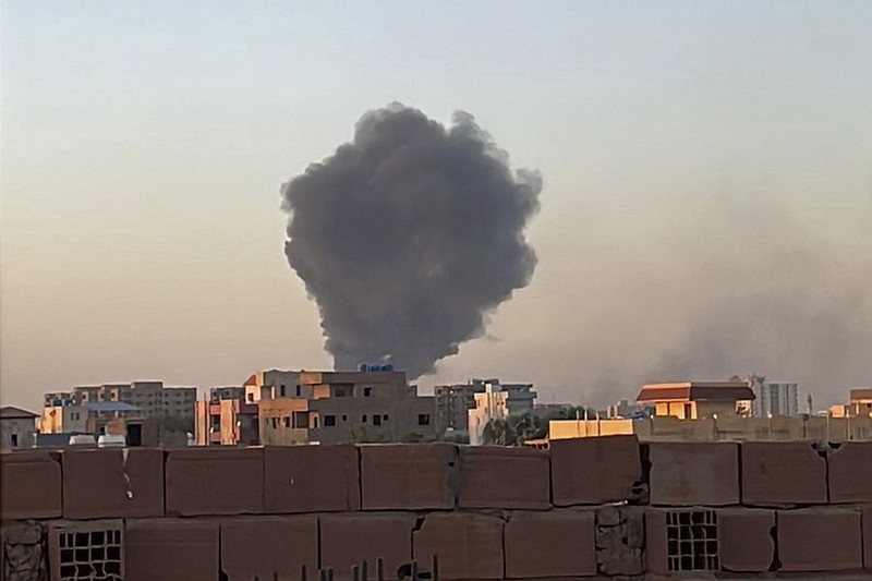 In this photo provided by Maheen S , smoke fills the sky in Khartoum, Sudan, near Doha International Hospital on Friday, April 21, 2023.  The Muslim Eid al-Fitr holiday, typically filled with prayer, celebration and feasting — was a somber one in Sudan, as gunshots rang out across the capital of Khartoum and heavy smoke billowed over the skyline. (Maheen S via AP)