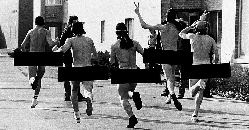 Eau Claire students, buoyed by warmer temperatures, Monday March 5, 1974 in Eau Claire, took the college streaking craze to heart. The quintet of dormitory students, wearing only hoods, and tennis shoes, ran up some 90 steps to the UW-EAU Claire upper campus, down a side walk and into governors hall men' wing. (AP Photo)
