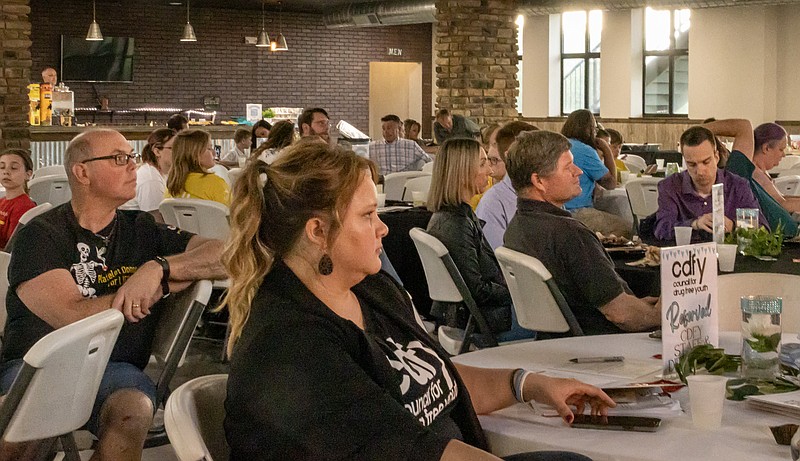 Josh Cobb/News Tribune. Members of the Council For Drug Free Youth gathered at the Capital Bluffs Event Center on Thursday evening for a banquet.