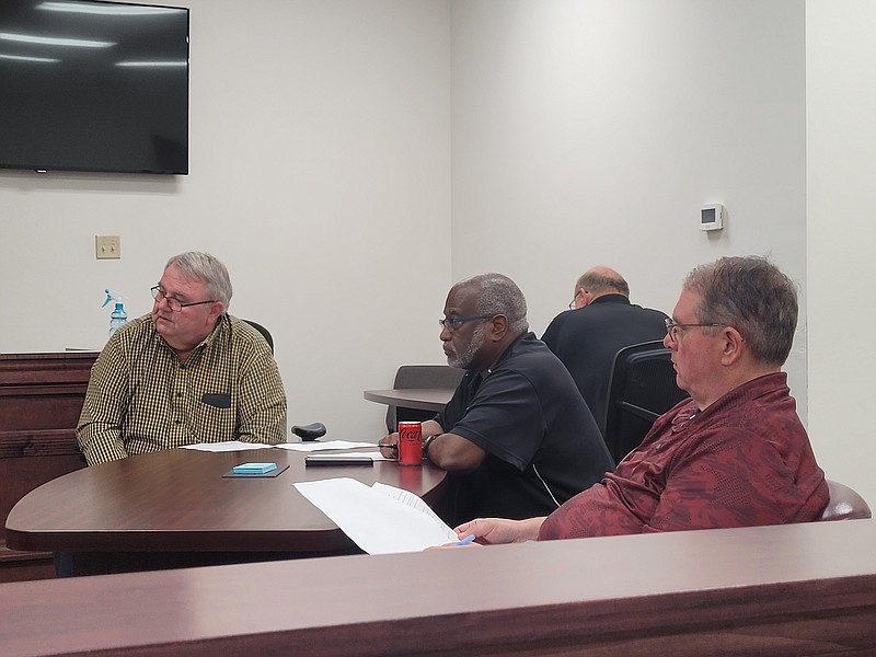 photo by Bradly Gill
Ouachita County Judge Robert McAdoo, Justice of the Peace Fred Lilly and Justice of the Peace Dale Vaughn gather at a meeting held Thursday night to discuss the feasibility of building a detention center in Ouachtia County.