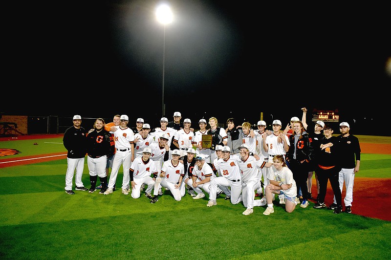 Lions fend off Cardinal rally to win district