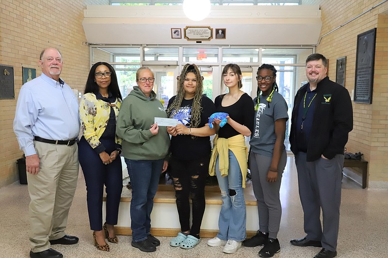 Representatives from Fulton City Hall and the Sam and Daisy Grabb Animal Shelter accept a $700 check from Missouri School for the Deaf National Honor Society members. Left to right: Steve Myers, Fulton Mayor; Renee Tyler, Fulton director of administration; Tina Barnes, Sam and Daisy Grabb Animal Shelter supervisor; Lindsay Freeman, MSD student; Schandera Moritz, MSD student; Tracy Austin, MSD student; and Christopher Daily, MSD superintendent.