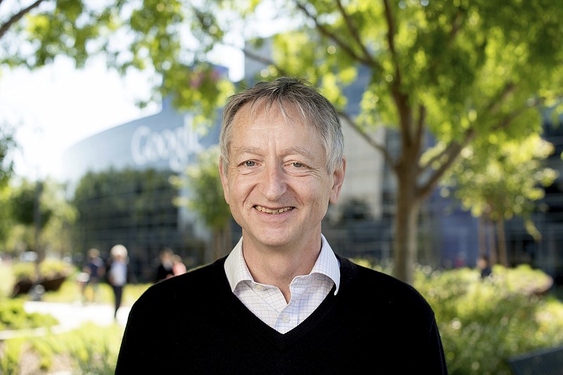Computer scientist Geoffrey Hinton, who studies neural networks used in artificial intelligence applications, poses at Google's Mountain View, Calif, headquarters on Wednesday, March 25, 2015. Hinton, the man widely considered as the “godfather” of artificial intelligence, has left Google — with a message sharing his concerns about potential dangers stemming from the same technology he helped build. (AP Photo/Noah Berger)