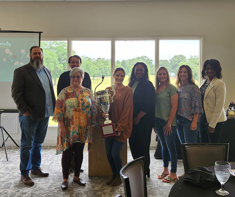 Liz Fairris, holding the trophy, was named the 2023 Administrative Professional of the Year on April 26. Fairris is pictured here with other nominees for the recognition during an Administrative Professionals Luncheon hosted by the El Dorado-Union County Chamber of Commerce on Administrative Professionals Day. (Courtesy of the El Dorado-Union County Chamber of Commerce/Special to the News-Times)