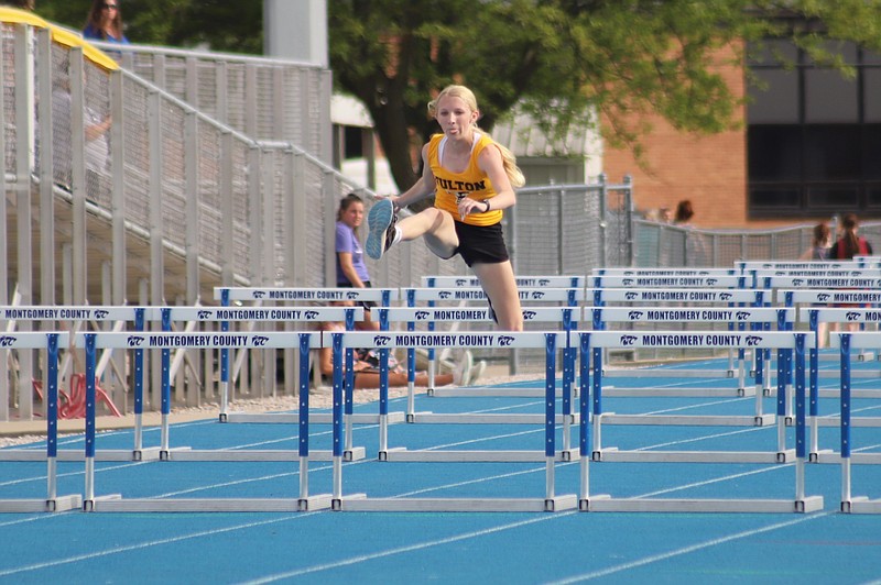 Fulton's Addison Milius competes in the 100-meter hurdles in the Montgomery County Middle School Last Chance meet Thursday at Montgomery County High School in Mongomery City. Milius broke the school record in the event with a time of 17.92 seconds. (Fulton Sun/Robby Campbell)