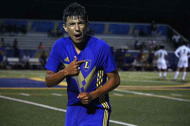 Lakeside's Leo Santillan (7) celebrates the Rams' second goal against Hot Springs May 6, 2022. - Photo by Krishnan Collins of The Sentinel-Record