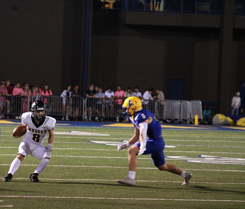 Lakeside's Christian Bell, right, attempts to tackle DeQueen's Tye Lindsey Oct. 21, 2022, at Lakeside Stadium. - Photo by Lance Porter of The Sentinel-Record