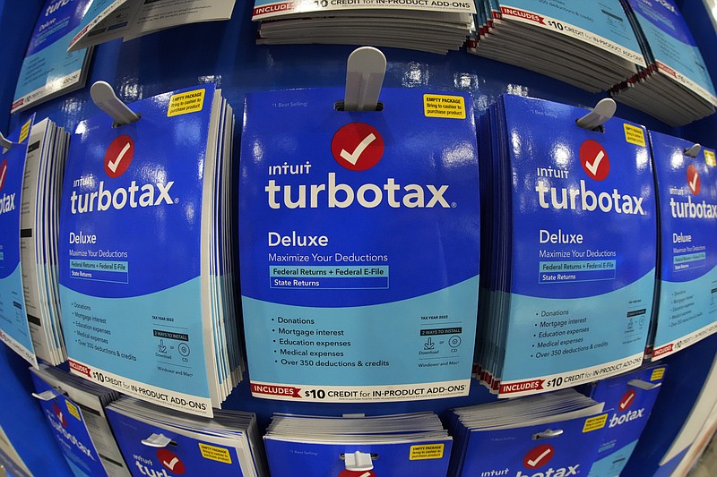 This is a display of TurboTax on display in a Costco Warehouse in Pittsburgh on Thursday, Jan. 26, 2023. In a settlement agreement last year, TurboTaxs owner Intuit Inc. was ordered to pay $141 million to low-income consumers who were deceived into paying TurboTax to file their federal returns — despite being eligible for free, federally-supported tax services.  
(AP Photo/Gene J. Puskar)