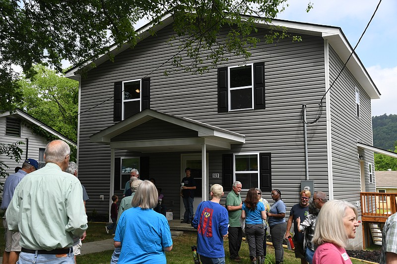 The first two-story Garland County Habitat for Humanity home at 513 Grove St. was dedicated to new owner Nikkie Ponder and her five children Saturday. - Photo by Lance Brownfield of The Sentinel-Record.