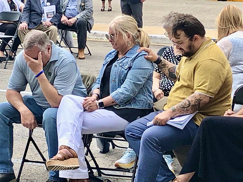 Joe Gamm/News Tribune photo: 
The family of Jake Reed, a Joplin Police Department officer who died in the line of duty, reacts as Taps begins to play during the Missouri Law Enforcement Memorial ceremony Saturday morning, May 6, 2023. Reed was shot March 8, 2022 and died on March 9, 2022, after he responded to a disturbance call at a business.