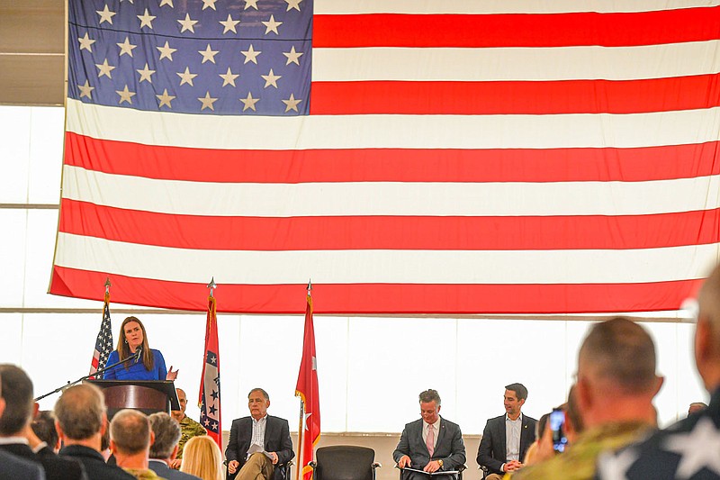 Arkansas Governor Sarah Huckabee Sanders speaks, Friday, May 5, 2023, during a press conference at the Ebbing Air National Guard Base in Fort Smith. Gov. Sanders, Sen. John Boozman, Sen. Tom Cotton, Rep. Steve Womack, Secretary of the Military Maj. Gen. Jon Stubbs, Col. Gator Ator, Fort Smith Mayor George McGill and Fort Smith Chamber of Commerce President and CEO Tim Allen all spoke at the event to celebrate the baseâ€™s official selection as a F-35 Future Pilot Training Center. Visit nwaonline.com/photo for today's photo gallery.
(River Valley Democrat-Gazette/Hank Layton)