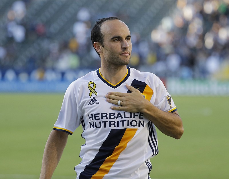 FILE - In this Sept. 11, 2016, file photo, Los Angeles Galaxy's Landon Donovan reacts during his playing days as he walks on the pitch after the team's MLS soccer match against Orlando City in Carson, Calif. Landon Donovan, who played in three World Cups and scored 57 goals across 157 international appearances for the United States, was enshrined in the National Soccer Hall of Fame on Saturday, May 6, 2023. (AP Photo/Jae C. Hong, File)