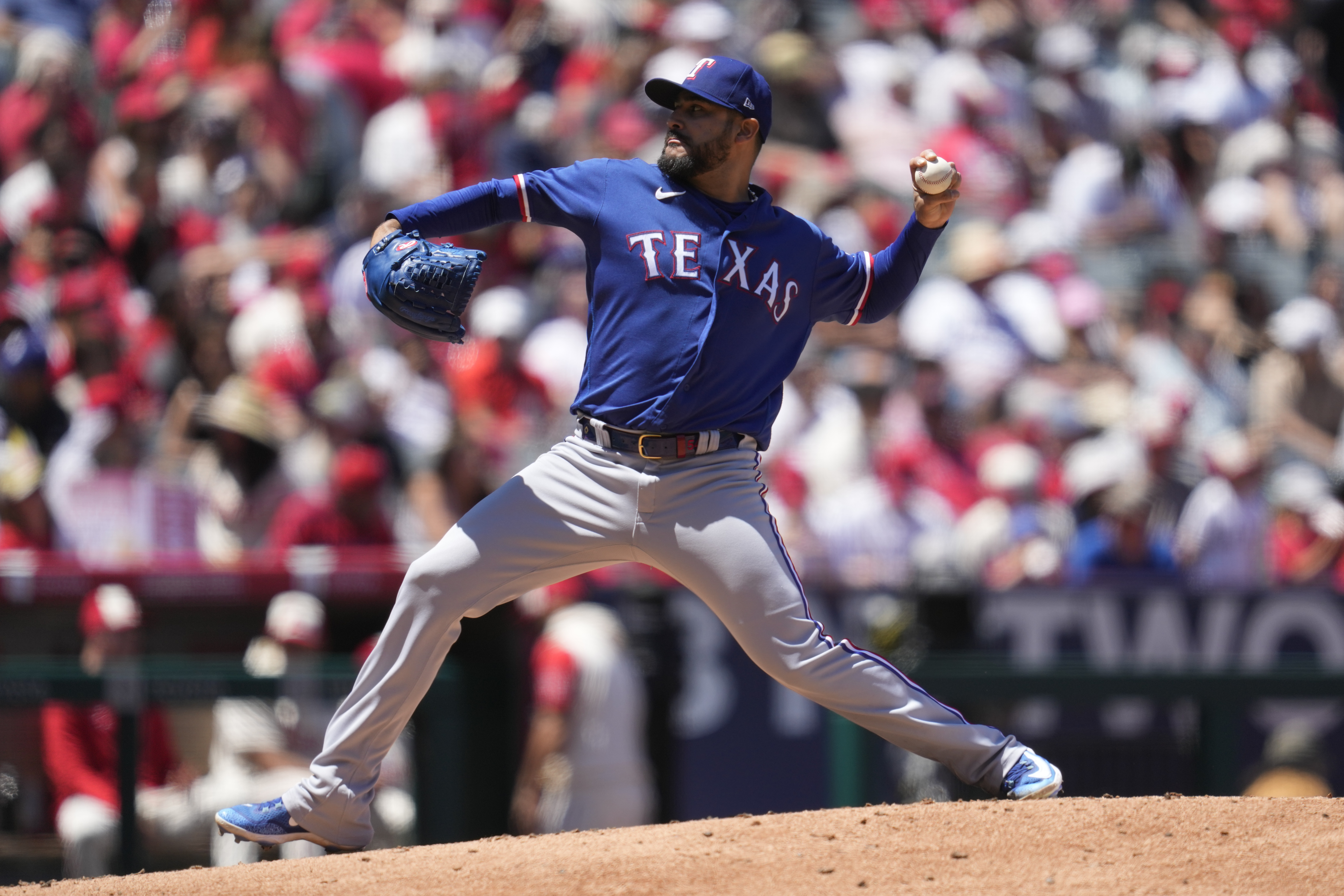 Texas Rangers starting pitcher Martin Perez (54) pitching in the