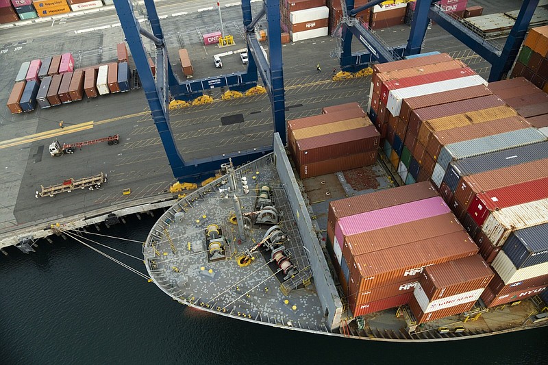 Shipping containers are stacked up on a cargo ship at the Port of Los Angeles in February. MUST CREDIT: Bloomberg photo by Lauren Justice