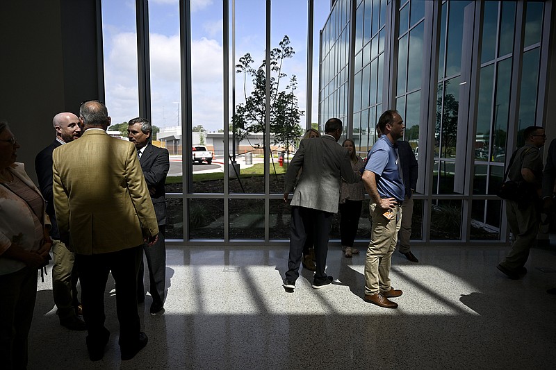 People explore the lobby of the new Orthopedic and Spine Hospital on the UAMS Campus in Little Rock as they tour the new building after a ribbon cutting ceremony on Monday, May 8, 2023.

(Arkansas Democrat-Gazette/Stephen Swofford)