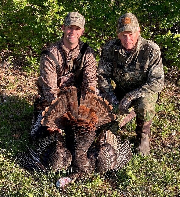 Photo courtesy of Missouri Department of Conservation: 
Clayton Graham (left) and hunting mentor John Eisenbath pose with a turkey after the pair participated in a managed hunt in early May 2023 at August A. Busch Shooting Range in St. Charles. MDC reports hunters harvested 44,543 turkeys during the 2023 spring season.