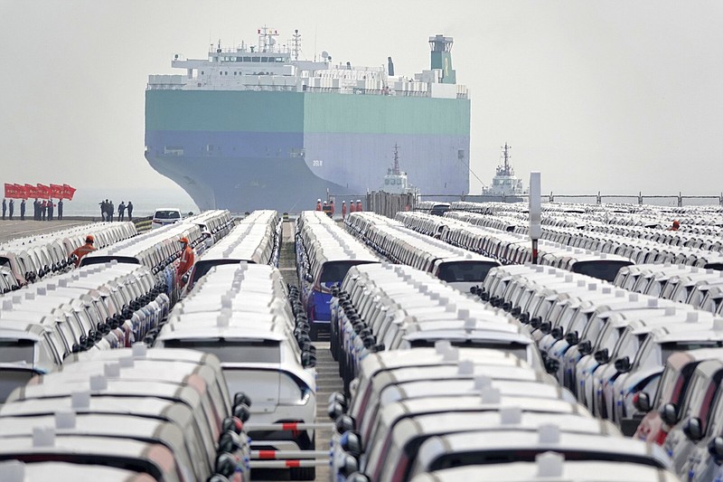 Vehicles for export are parked on a dock at a port in Yantai in eastern China's Shandong Province, Tuesday, May 9, 2023. Chinese exports grew 8.5% in April, showing more unexpected strength despite weakening global demand, customs data showed Tuesday. (Chinatopix via AP)
