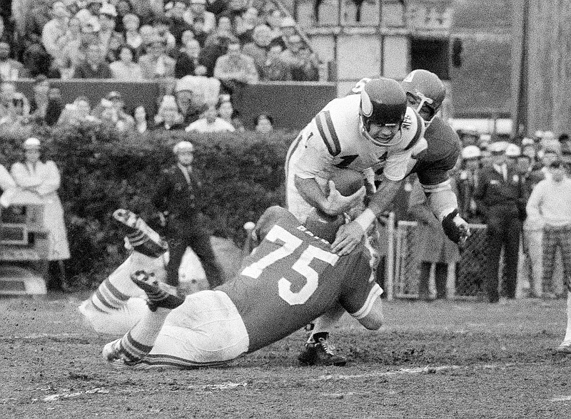 FILE - Minnesota Vikings quarterback Joe Kapp is hauled down by Kansas City Chiefs' Jerry Mays (75) as another Chiefs player moves in from the rear during the first half of the Super Bowl IV football game in New Orleans, Jan. 11, 1970. Kapp, the tough quarterback who led the Minnesota Vikings to their first Super Bowl and California to its last Rose Bowl, has died. He was 85.
Cal confirmed that Kapp died on Monday, May 8, 2023. (AP Photo/JS, File)