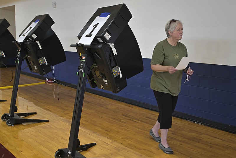 Nancy Bryant of Springdale finishes voting, Tuesday, May 9, 2023 during a special election at the Archer Learning Center in Springdale. Visit nwaonline.com/photos for today's photo gallery.

(NWA Democrat-Gazette/Charlie Kaijo)