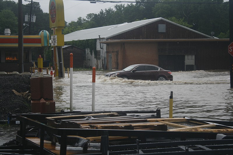 Several areas in El Dorado saw high waters Thursday morning including the intersection of Hillsboro Street and Bradley Ave. (Matt Hutcheson/News-Times)