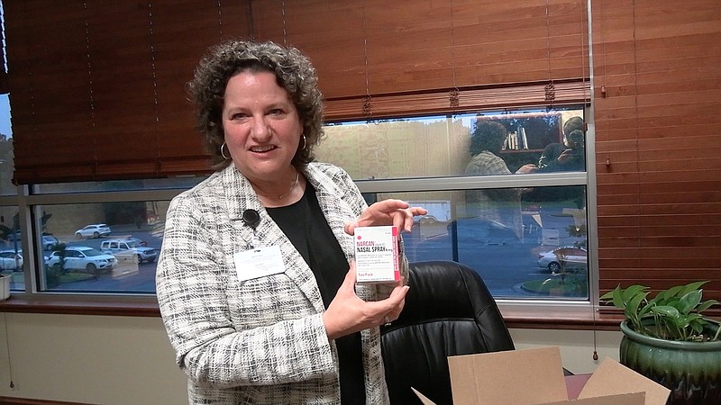 Susan Smith, the chief operating officer of Ouachita Behavioral Health and Wellness, discusses a grant OBHAW received to provide NARCAN and training on how to use the drug to reverse an opioid overdose. - Photo by Lance Porter of The Sentinel-Record