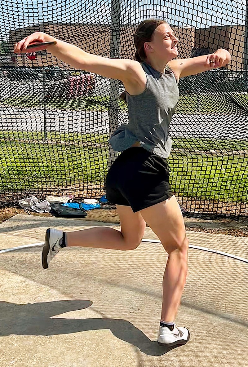 Randy Moll/Westside Eagle Observer
Abby Schopper, a junior at Gentry High School, practices on May 9 before the May 10 Meet of Champions in Russellville. Schopper has excelled in throwing the discus this year for the Gentry track and field team.