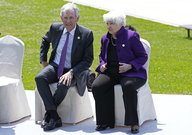 Treasury Secretary Janet Yellen, right, and Federal Reserve Chairman Jerome Powell chat prior to a group photo session of the G7 meeting of finance ministers and central bank governors, at Toki Messe in Niigata, Japan, Friday, May 12, 2023. This year's projected government budget deficit has jumped by $130 billion, due in part to a proposed change to student loan repayment plans and a series of bank rescues organized by federal regulators, the Congressional Budget Office said Friday. (AP Photo/Shuji Kajiyama)