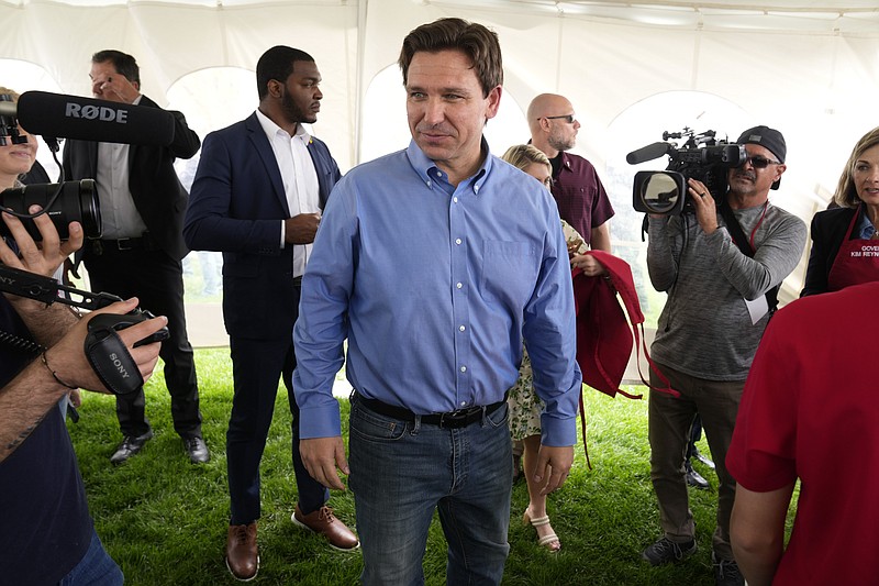 Florida Gov. Ron DeSantis greets audience members during a fundraising picnic for U.S. Rep. Randy Feenstra, R-Iowa, Saturday, May 13, 2023, in Sioux Center, Iowa. (AP Photo/Charlie Neibergall)