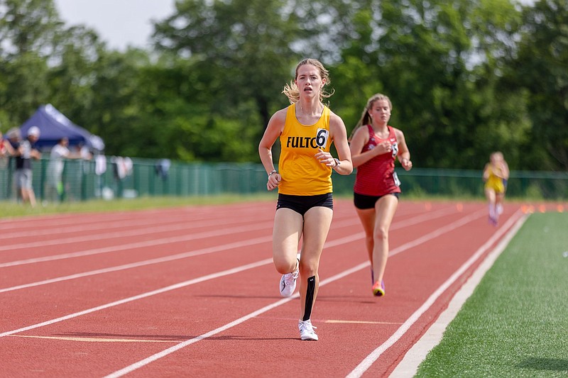 Fulton's Ava Santhuff sprints in the 1,600-meter run in the Class 4 District 4 meet Friday at North Point High School in Wentzville. (Courtesy/Alan Combs Photography)