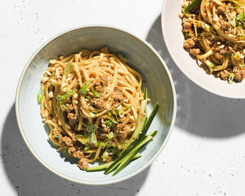This image released by Milk Street shows a recipe for spicy pork and oyster sauce noodles. (Milk Street via AP)
