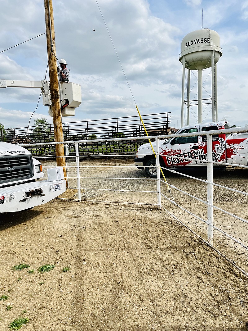 Photo courtesy Callaway Youth Expo: 
A Kingdom Telephone employee works on a pole at the Callaway Youth Expo fairgrounds. Kingdom Telephone donated and installed a new sound system for the fairgrounds.