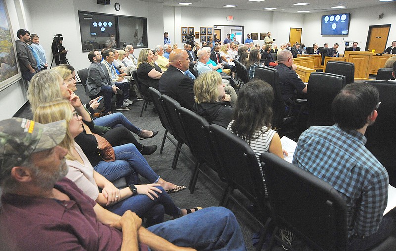 An uncommonly large crowd attends the Jefferson City Council meeting Monday. The council voted to amend city code and stop Saturday enforcement of downtown metered and unmetered parking. Enforcement will still continue Monday through Friday. The new proposal passed unanimously. Shaun Zimmerman/News Tribune