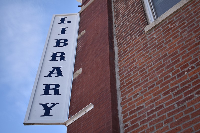 Democrat photo/Garrett Fuller — FILE — The "Library" sign is seen Sept. 26, 2022, at the Moniteau County Library at Wood Place in California.
