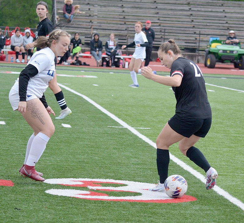 Graham Thomas/McDonald County Press
McDonald County junior Mayson Ardemagni possesses the ball against Marshfield in a game played April 27 at Mustang Stadium.