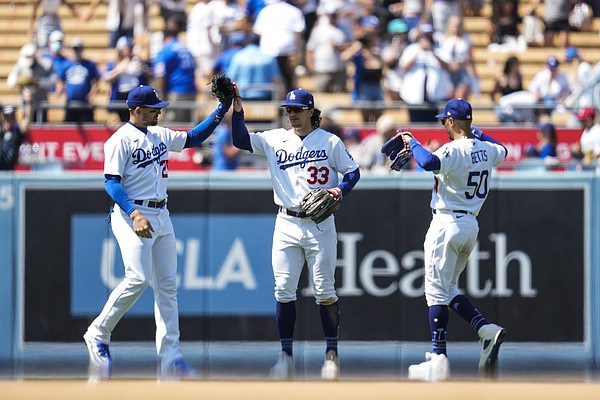 Outman grand slam lifts Dodgers past Twins