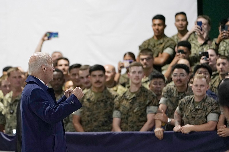 The Associated Press
President Joe Biden greets troops upon his arrival at Marine Corps Air Station Iwakuni in Iwakuni, Japan, on Thursday. Biden made the stop on his way to attend the G-7 Summit in Hiroshima, Japan.