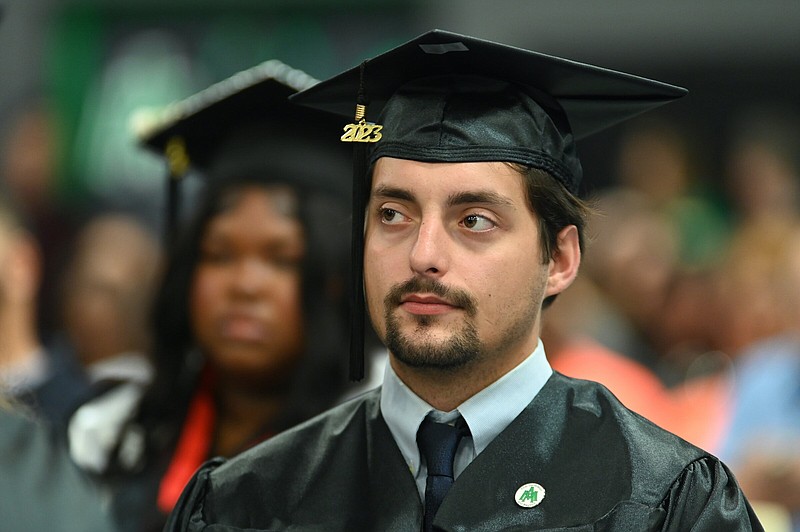 Graduates of the University of Arkansas at Monticello received their degrees inside Steelman Field House last Friday. (Special to The Commercial)