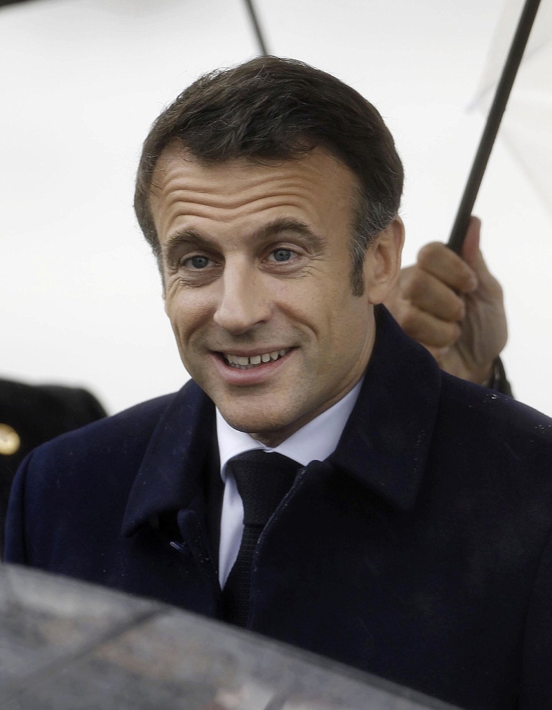 French President Emmanuel Macron arrives at Hiroshima airport for the G7 summit, in Hiroshima western Japan, Friday, May 19, 2023.(Kyodo News via AP)